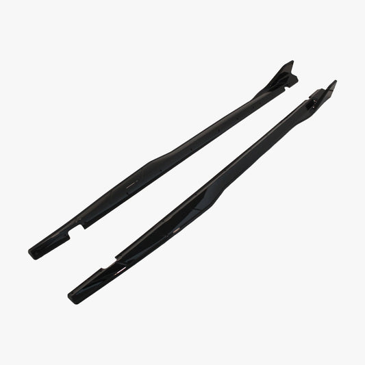 Black side skirt extension panels with mounting holes, angled view