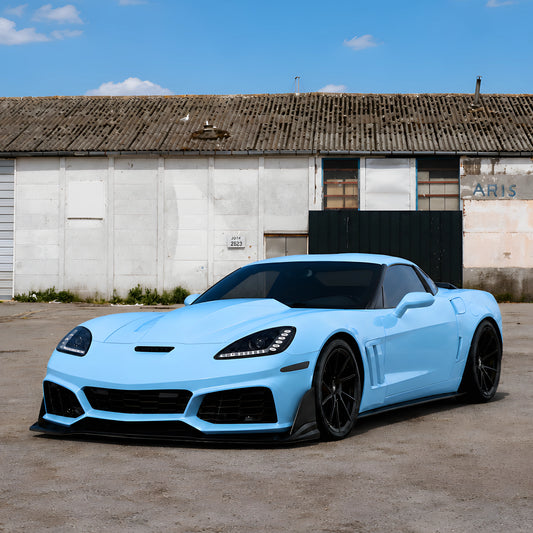 Light blue front bumper cover with aggressive splitter, vents, and mesh grille openings