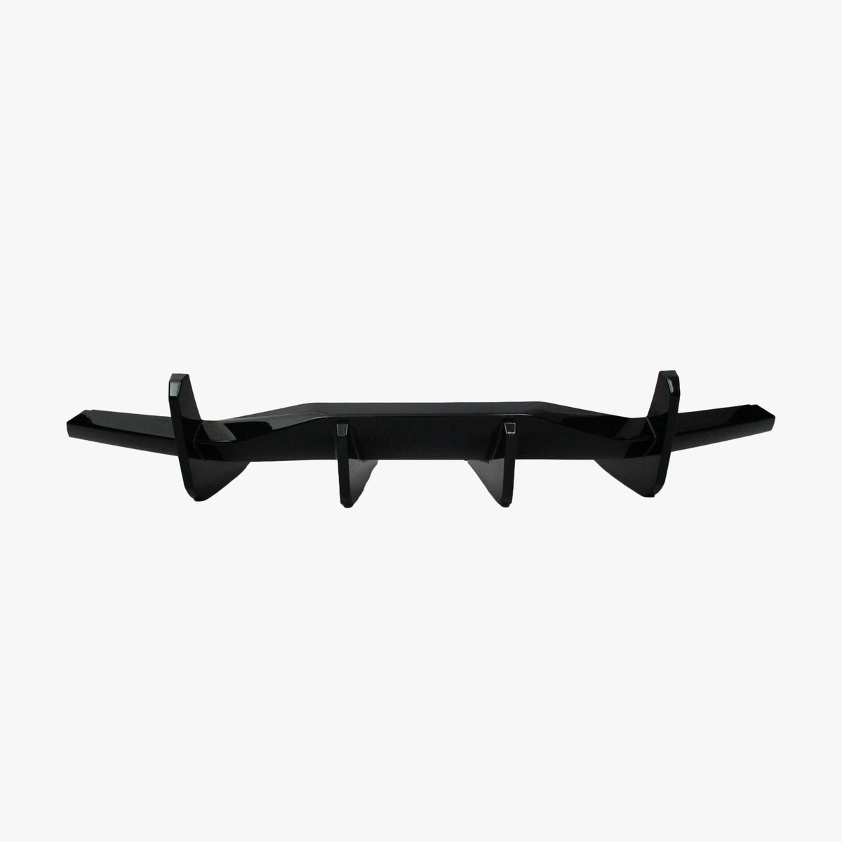 Black rear diffuser lip add-on with three vertical fins, matte black