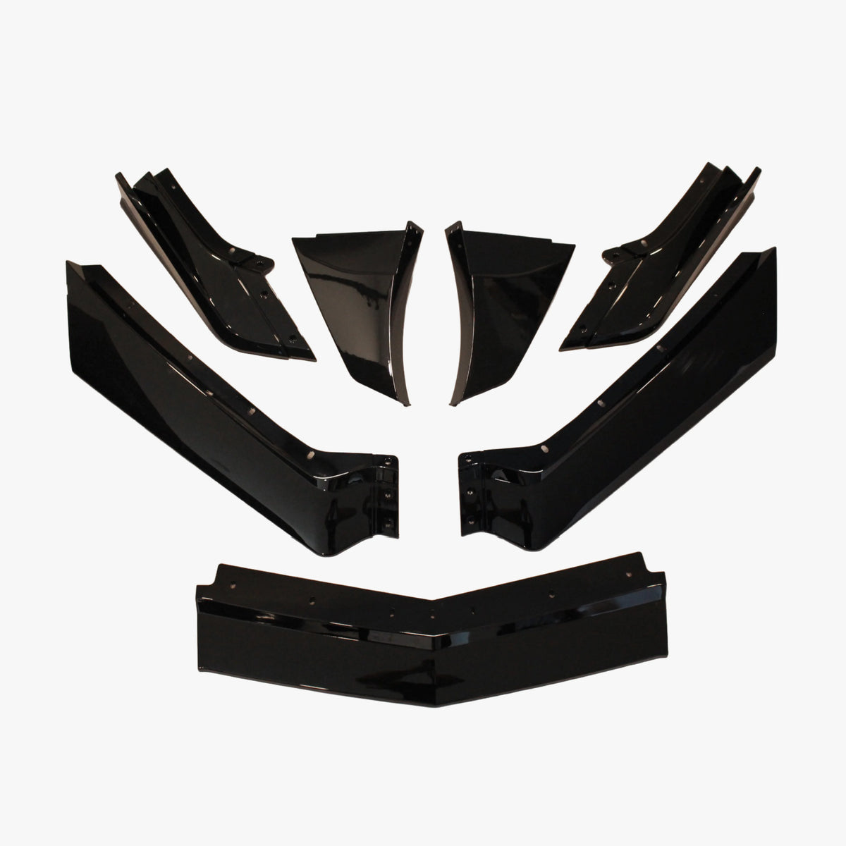 Front splitter kit with multiple glossy black aerodynamic fins and lip pieces