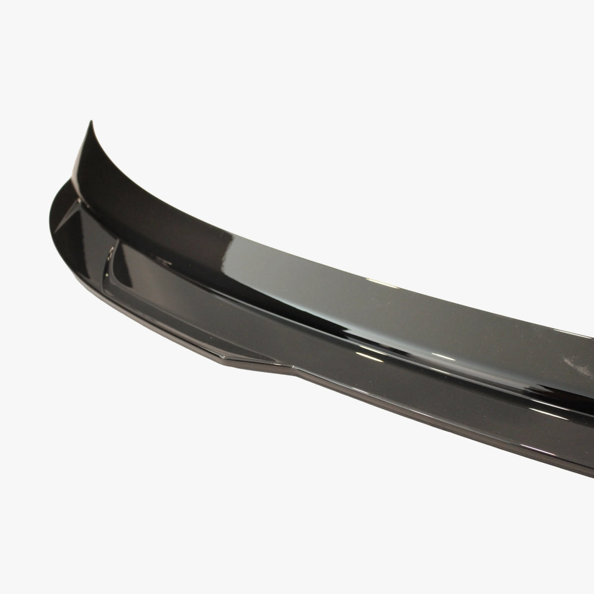 Glossy black rear trunk wing spoiler, close side section